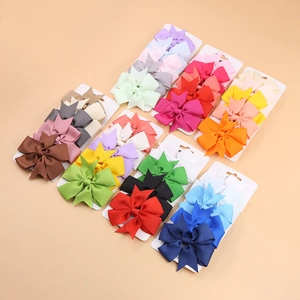 Set de pinzas para el pelo con lazos de cinta acanalada en colores para niñas