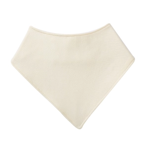 Close-up of cream cotton baby bib showing soft knit texture and stitched edging detail