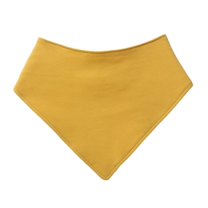 Detail of soft mustard yellow cotton baby bib showing fine stitching and smooth fabric texture