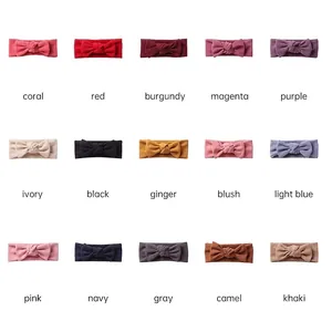 Elastic baby bow headbands in 15 assorted solid colors made of soft ribbed knit fabric
