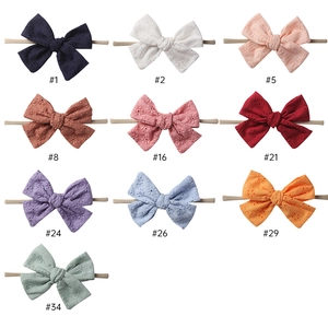 Set of 10 colorful cotton embroidered bow headbands with soft nylon bands for babies