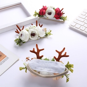 Christmas reindeer antler headband for babies with silk flowers and elastic nylon band