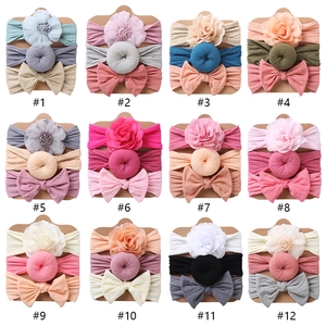 Baby girl nylon headband set featuring 3 styles with flowers and bows in 12 color options