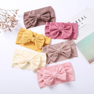 6-pack of baby elastic knit headbands with large bows in assorted pastel colors