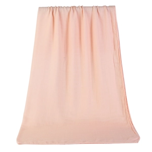 Close-up of soft pink bamboo cotton baby wrap with breathable square texture fabric