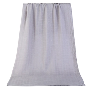Close-up of soft lavender bamboo cotton swaddle blanket with breathable square weave texture