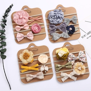 Five-piece set of elastic baby headbands with chiffon flowers and velvet bows on card