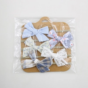 Detailed set of 5 handmade infant headbands featuring floral and lace bow designs