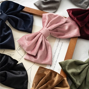 Velvet oversized bow hair clips in multiple vintage colors for elegant styling