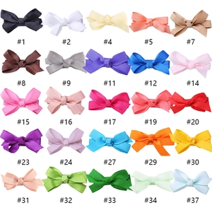 Set of 25 colorful grosgrain ribbon hair bows for girls in a high-quality 5x5 matrix layout