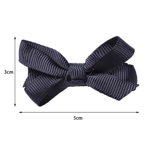 Handmade black ribbed fabric bow hair clip for girls with a width of 5cm and height of 3cm