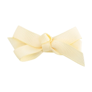 Close-up of cream floral fabric hair bow clip with ribbed texture for girls