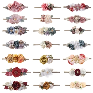 Set mit 21 Baby-Haarbändern mit Stoffblumen und Perlen für kleine Mädchen