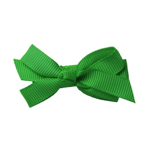 Close-up of vibrant green layered grosgrain ribbon bow hair clip for young girls