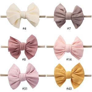 Set di 6 fasce in nylon morbido con fiocchi fatti a mano per neonati in colori assortiti