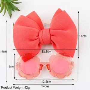 Set occhiali da sole a fiore e fascia con grande fiocco rosa corallo per bambini
