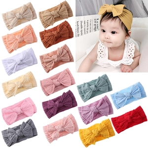 Détail de 16 bandeaux bébé en nylon jacquard coloré avec nœud papillon élégant