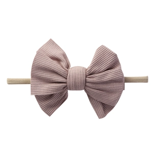 Dettaglio fascia per neonati in nylon con fiocco in maglia a coste rosa Morandi