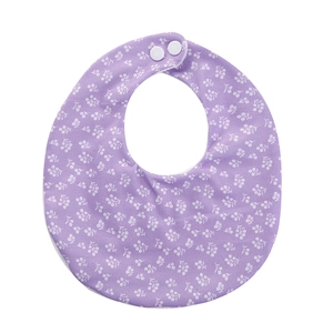 Detail of baby bib in light purple with white floral patterns and dual snap button closure