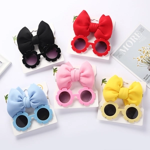 Occhiali da sole a fiore per bambini con grandi fiocchi in cinque colori vivaci