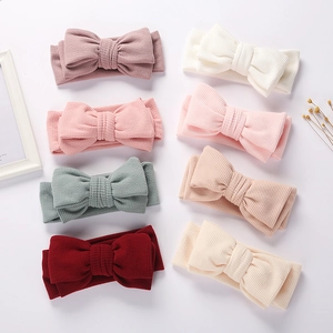 Lot de 8 bandeaux bébé en maille gaufrée avec grands nœuds en couleurs pastel variées
