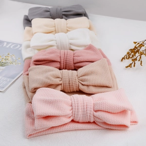 Lot de 6 bandeaux côtelés doux pour bébés avec nœuds en rose, kaki, blanc et beige