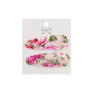 Close-up of floral fabric water-drop hair clips with rose embroidery on display card