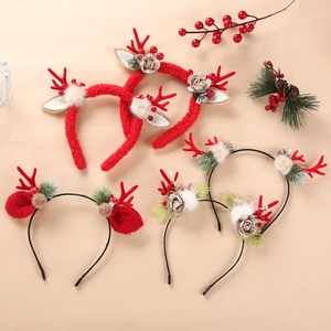 Christmas reindeer antler headband set with red berries flowers and bells festive hair decor
