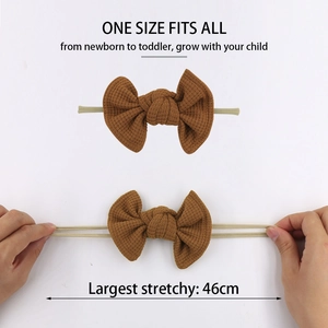 Brown waffle texture baby bow headband with high elasticity for newborns to toddlers