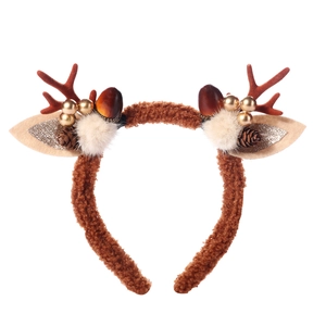 Detailed close-up of brown plush Christmas reindeer antler headband with festive ornaments