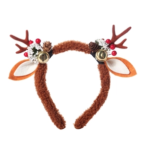 Detail of reindeer antler headband with brown fleece, small pine cones and golden bells
