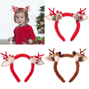 Christmas reindeer antler headband with bells and berries for festive holiday hair decor