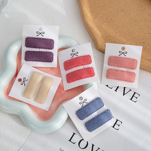 Set of pastel faux cashmere square BB hair clips for children in diverse autumn colors