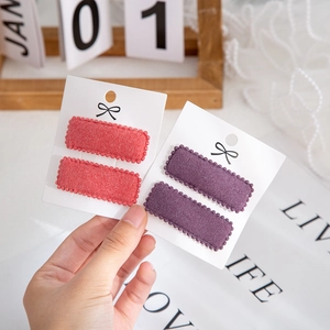 Faux cashmere square BB clips for children in red and purple colors with wavy stitching