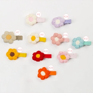 Set of 10 colorful handmade knitted flower hair clips for girls in various pastel shades