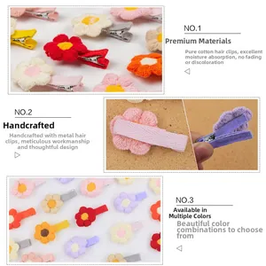 Detail of handmade knit flower hair clips with soft cotton petals and cloth-wrapped clips