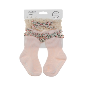 Detailed set of pink ribbed baby socks and floral lace headband for infants aged 0-12 months