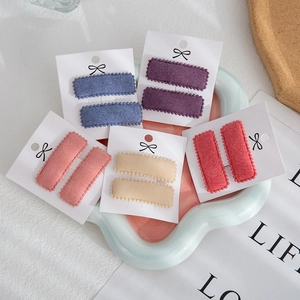 Set of 5 pairs of colorful faux cashmere square BB hair clips on a white display card