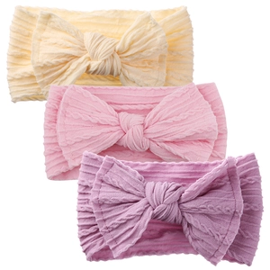 3-piece set of soft nylon baby headbands with large bows in beige, pink and lilac