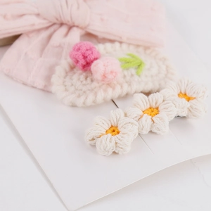 Handmade crochet flower hair clip set with tulip and daisy designs for girls