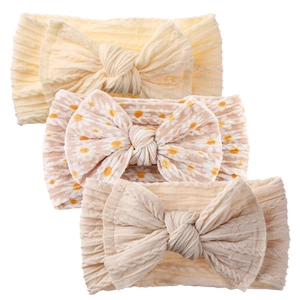 Three-piece baby nylon headband set with large soft bows and floral knit textures