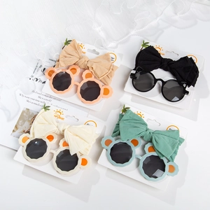 Panda bear ear sunglasses and bow headband sets in khaki, black, cream, and turquoise