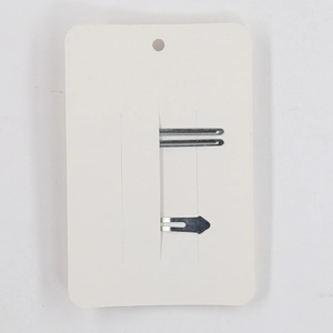 Polished silver metal hair clips set for kids on white display card for retail presentation