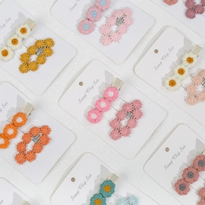 Handmade crochet flower snap clip set for baby girls in various macaron colors