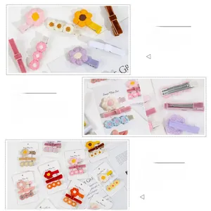 Détails des barrettes marguerites tricotées et des pinces en velours pour enfants