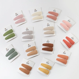 Set of 12 pairs of lace-edged fabric BB hair clips for girls in assorted pastel colors