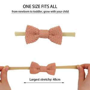 Detail showing the elastic nylon band of the knit baby headband with high stretch capacity