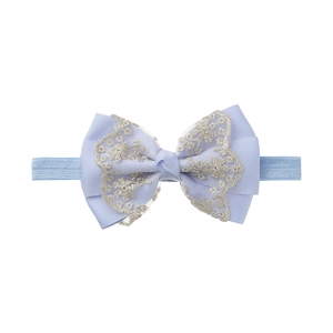 Detail view of baby lavender lace bow headband with silver floral embroidery