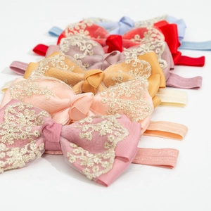 Elastic baby headbands with double-layer gold lace bow and soft nylon band in diverse colors
