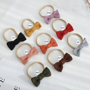 Set of nine soft cotton knit bow baby headbands with comfortable seamless nylon bands
